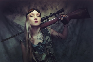 Обои Soldier girl with a sniper rifle на телефон HTC Desire