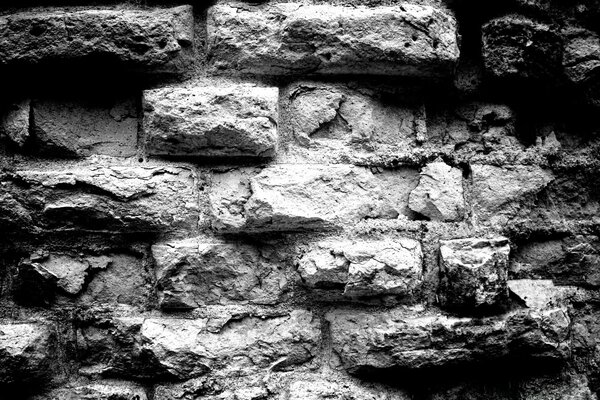 Старая кирпичная стена черный и белый