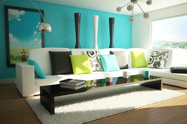 интерьер комната квартира диван подушки яркие цветные зеленый голубой книги стол кубик рубика кружка чашка лампы