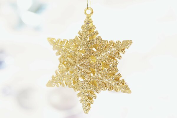 новый год рождество праздник звезда золотая украшение белый фон
