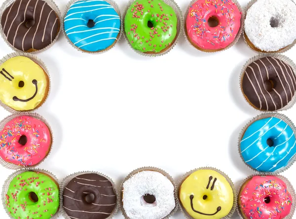 Разные Пончики глазированные в разных цветах — стоковое фото