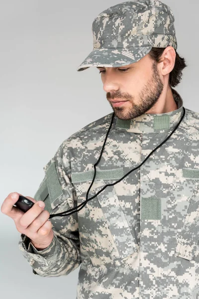 Portrait Soldier Military Uniform Stop Watch Grey Backdrop — стоковое фото
