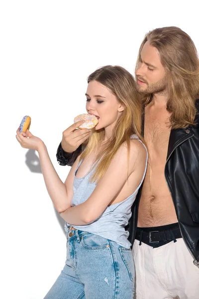 Stylish Young Couple Eating Tasty Donuts White — стоковое фото