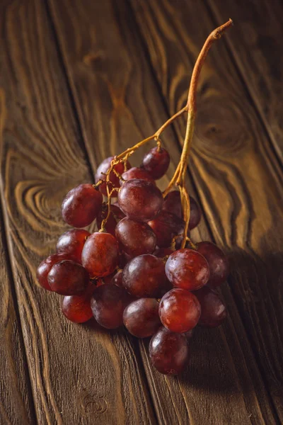 Close Shot Ripe Red Grapes Rustic Wooden Table — стоковое фото
