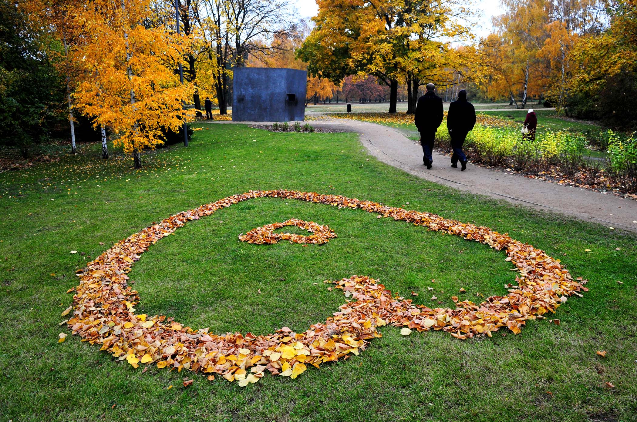 NOVEMBER 2: People walk past a heart made of autumnally colored leaves in Berlin's Tiergarten park. (Johannes Eisele/AFP/Getty Images)