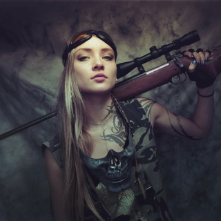 Обои Soldier girl with a sniper rifle для iPad