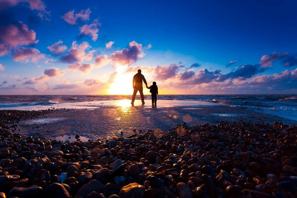 камни закат солнце свет море пляж лучи Берег