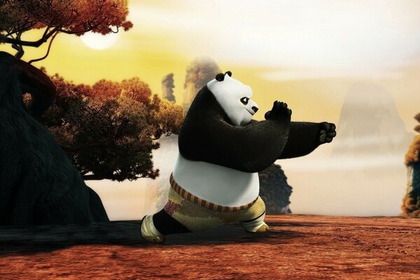 Панда из мультфильма Кунг-Фу панда тренирует приемы