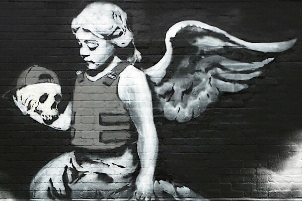 граффити бэнкси череп ангел