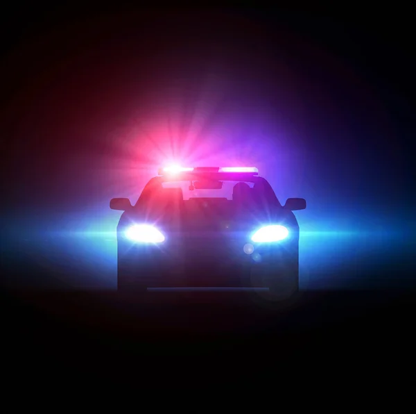 Полицейский автомобиль в темноте — стоковое фото