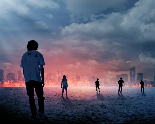 Group of zombie over burn city background — стоковое фото