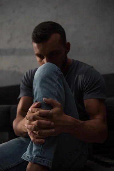 Upset Depressed Man Sitting Home Selective Focus — стоковое фото