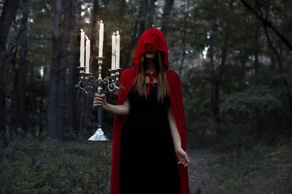 Mystic Girl Red Cloak Hood Holding Candelabrum Candles Dark Forest — стоковое фото