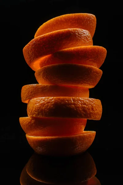 Close Shot Stacked Slices Fresh Orange Isolated Black — стоковое фото