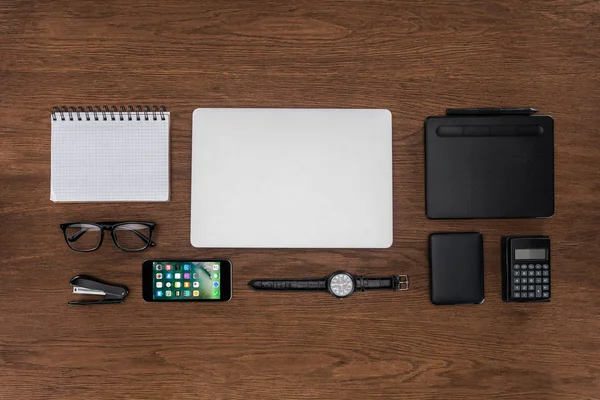 Top View Workplace Arranged Empty Textbook Laptop Wristwatch Iphone Wooden — стоковое фото