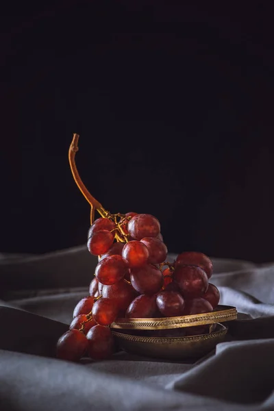 Close Shot Fresh Red Grapes Grey Drapery Black — стоковое фото