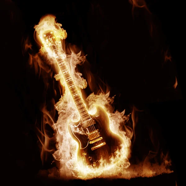 Electronic guitar enveloped flames — стоковое фото